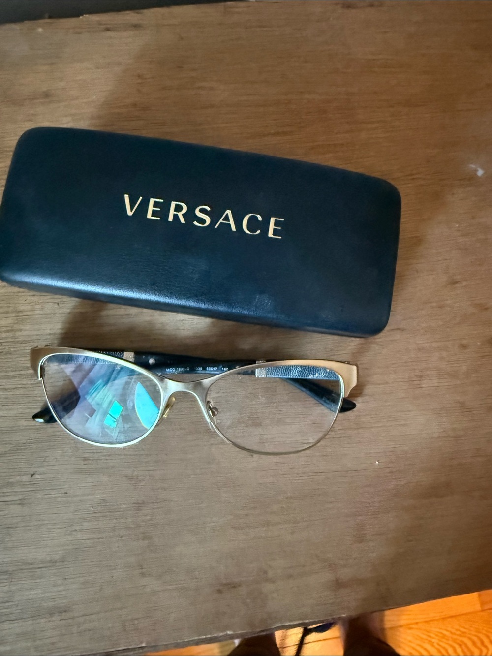 Versace VE1233Q Cat-Eye Eyeglasses in the pale gold and black color combination